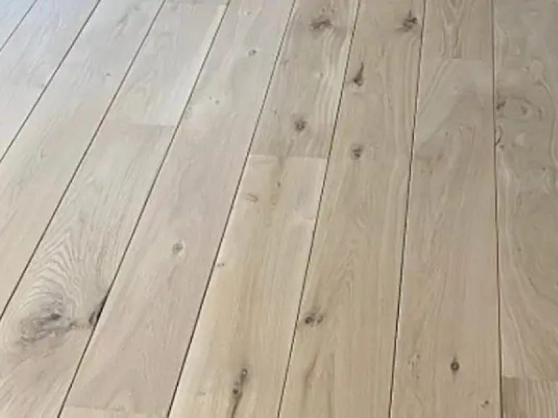 Pose de parquet massif : guide pour un sol durable et esthétique